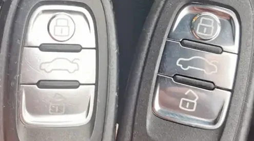 Two remote key fobs side by side